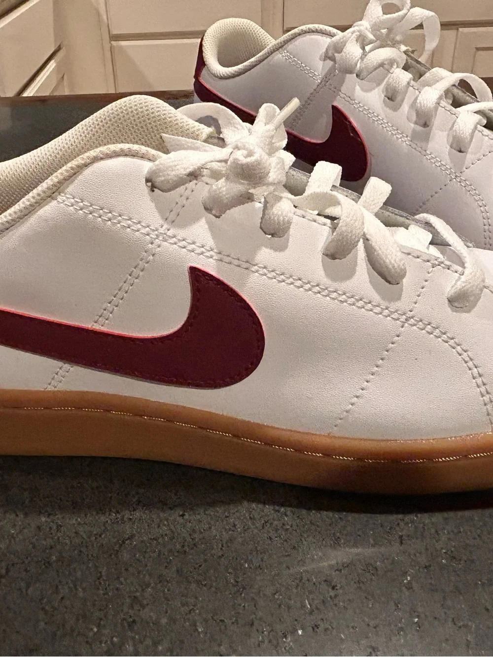 Nike White Sneakers with Gum Sole and Maroon Swoosh Accent